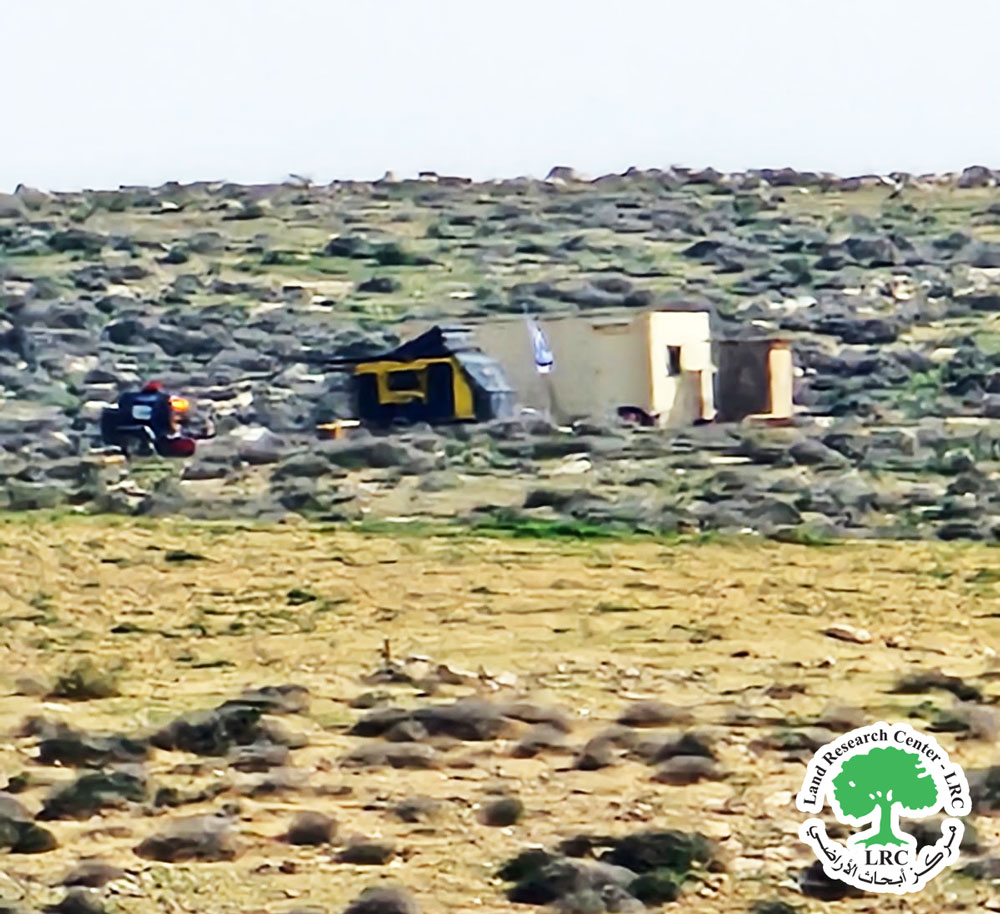 Israeli Colonists take control of agricultural lands in Khirbet al-Rahwa, closing them off and beginning land leveling in Dhahiriya town / Hebron Governorate | LRC